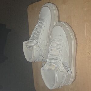 Lady Reebok  Leather and Suede feel High top Platforms size 8